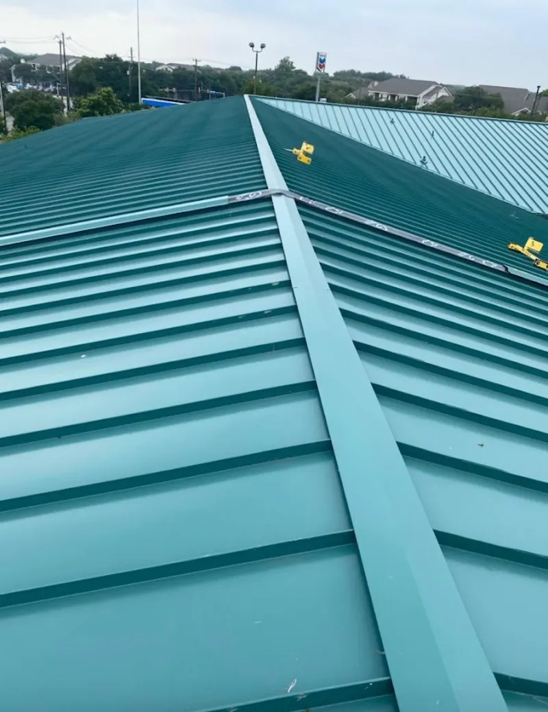 Green commercial metal roof ridge and valley for Metal Roof Repair in Hastings